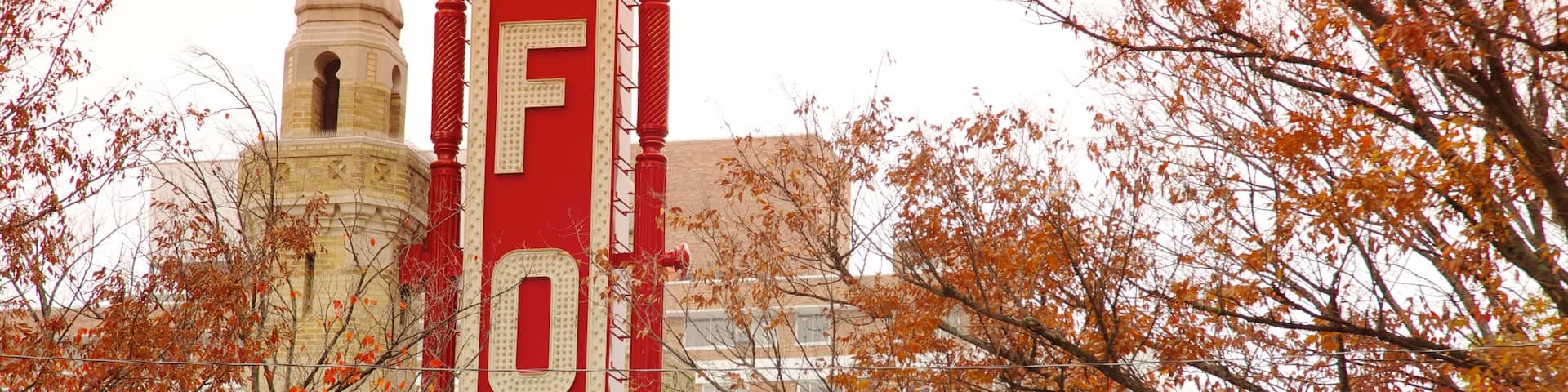 Fox Theatre featuring autumn leaves, signage and theater scenes
