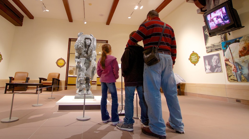 White River State Park featuring interior views and a park as well as a family