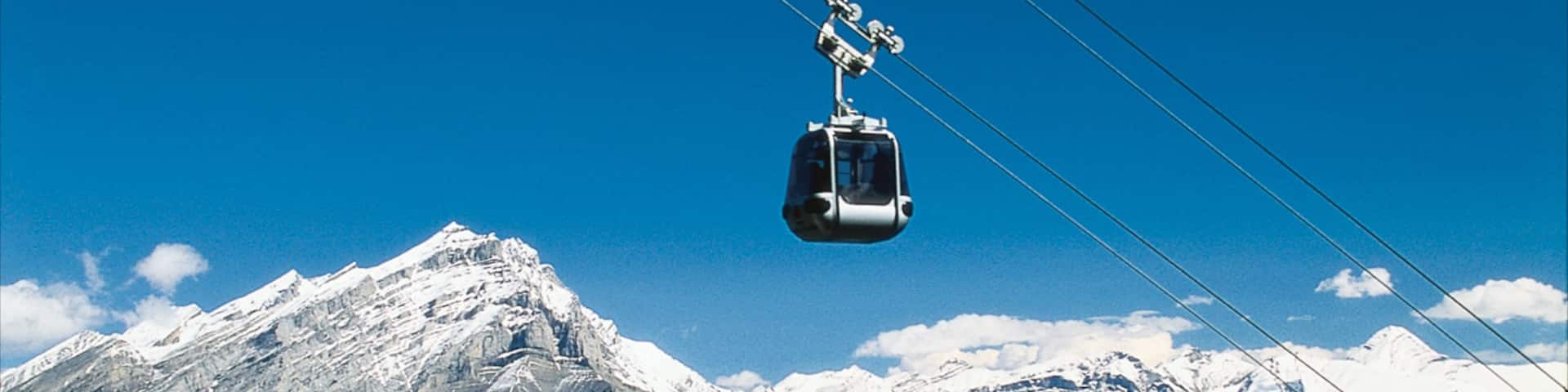 Banff Gondola which includes mountains, landscape views and snow