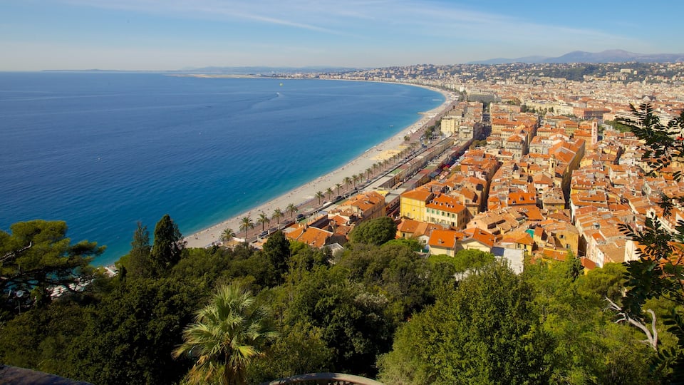 Nice which includes a beach, skyline and a pebble beach