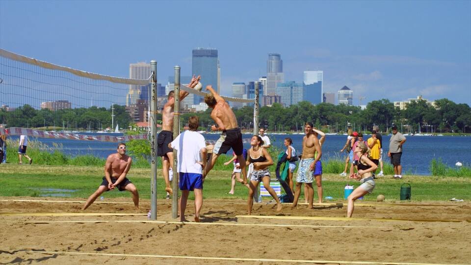Bde Maka Ska showing a sporting event, a skyscraper and a city