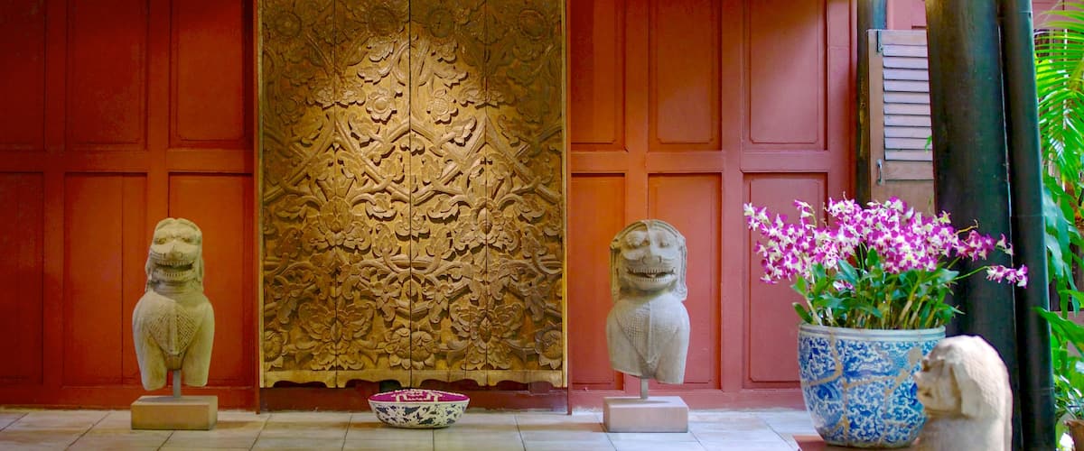 Jim Thompson House featuring flowers, a house and interior views