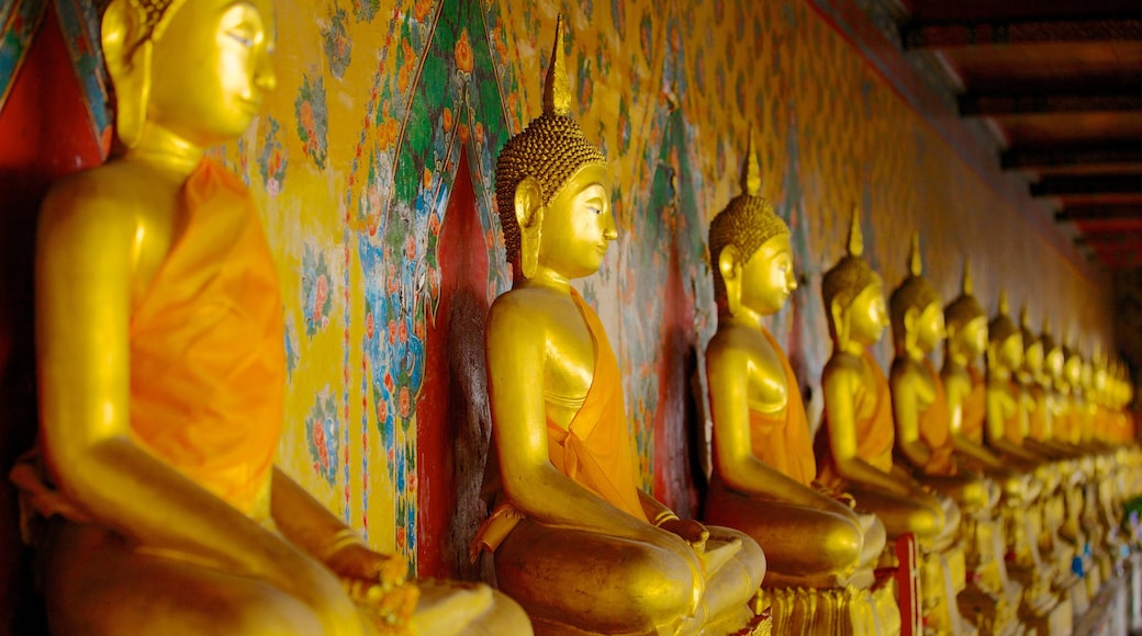 Wat Arun showing religious aspects and a statue or sculpture