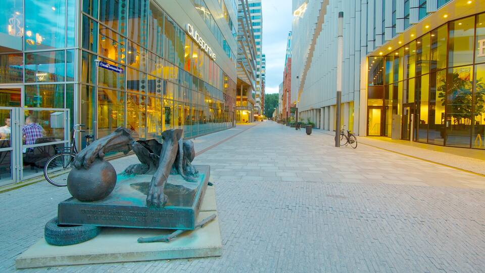 World Trade Center showing a city, modern architecture and a statue or sculpture