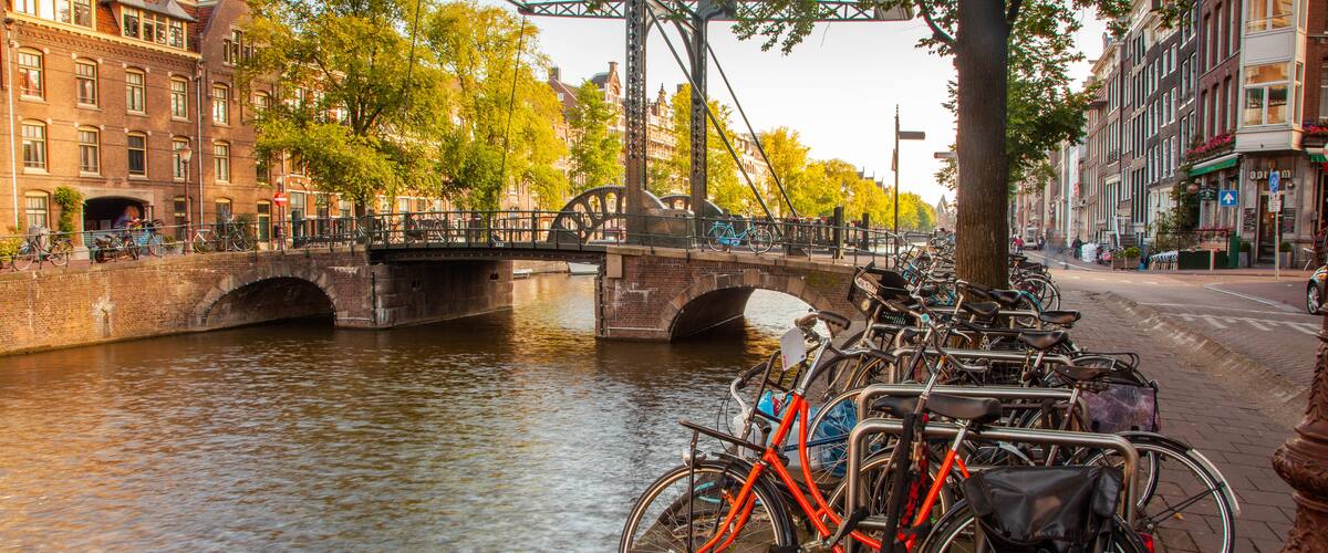 Muntplein featuring street scenes, a river or creek and a bridge