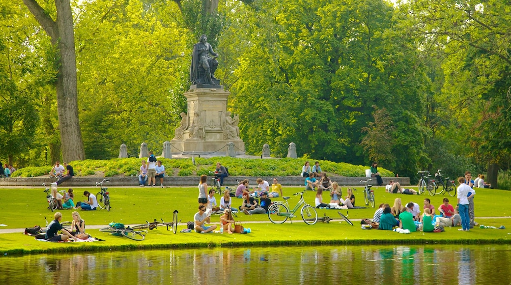 Amsterdam which includes picnicking, a garden and a statue or sculpture
