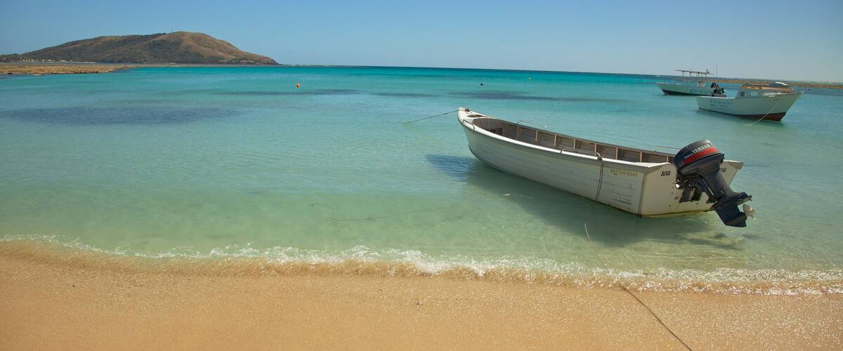Nacula Island showing boating, landscape views and a sandy beach