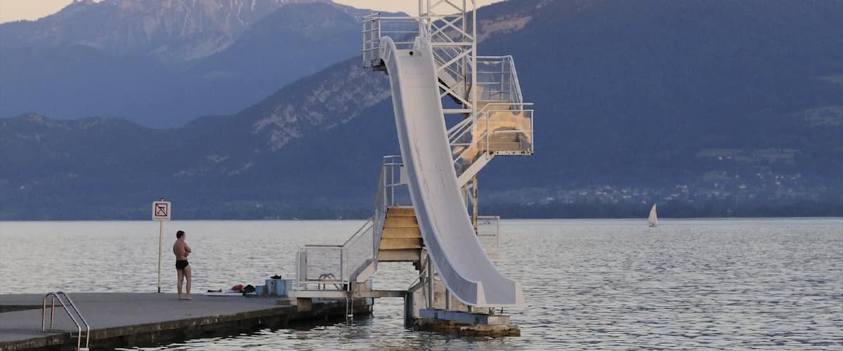Annecy which includes a marina, a bay or harbour and general coastal views