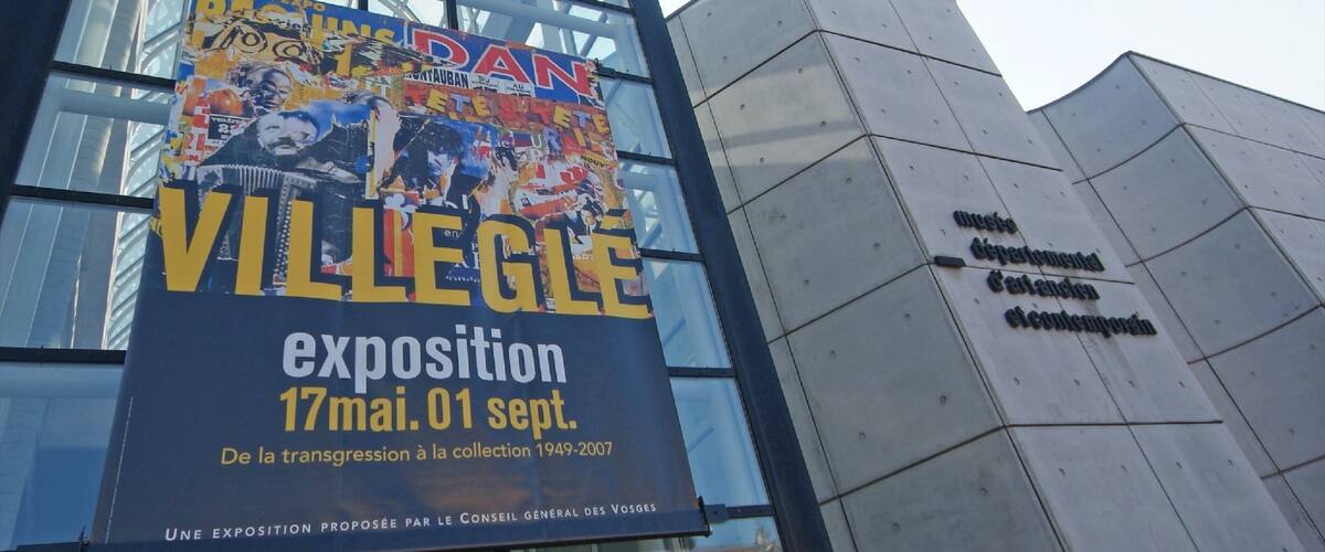 Epinal showing signage and a city