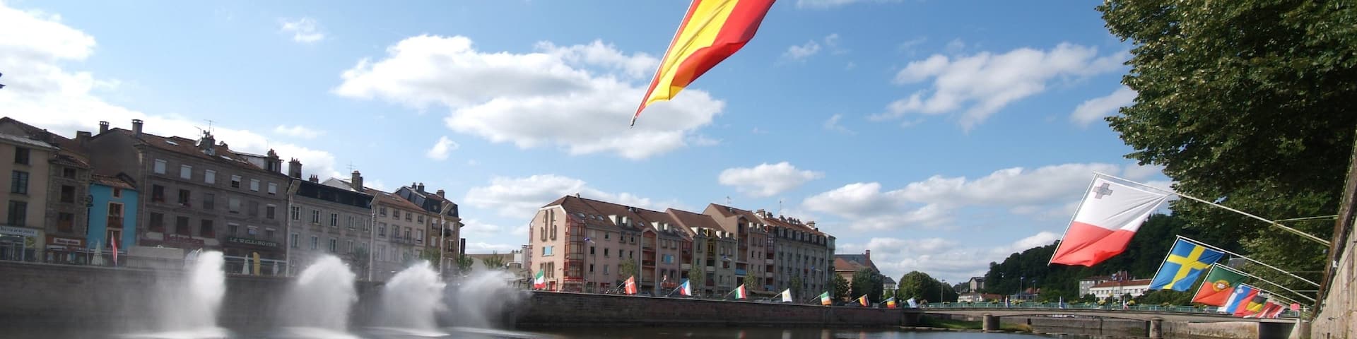 Epinal featuring a city, a river or creek and landscape views
