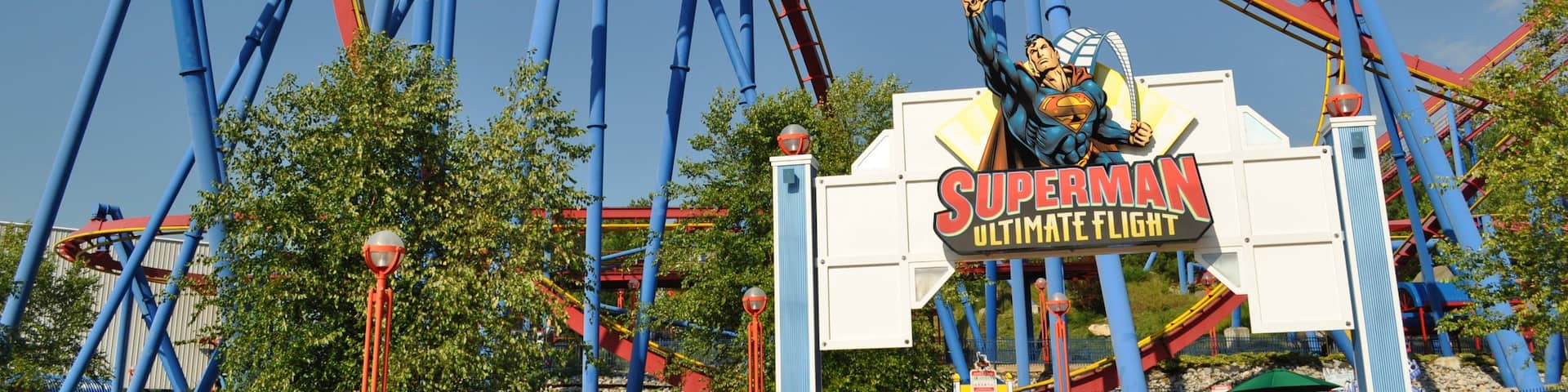 Six Flags Over Georgia which includes signage and rides