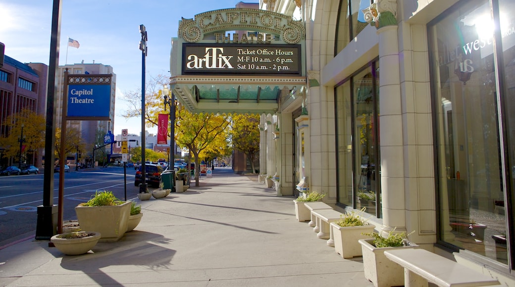 Capitol Theater showing theatre scenes, street scenes and a city