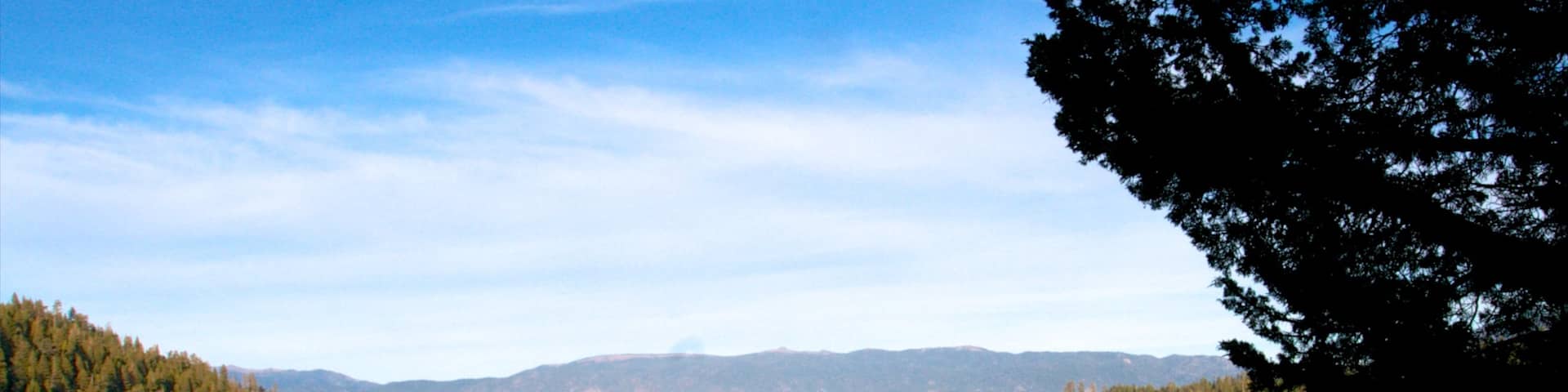 Emerald Bay State Park which includes landscape views, forests and general coastal views