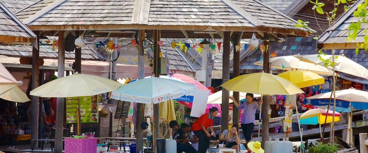 Pattaya Floating Market featuring a river or creek and markets