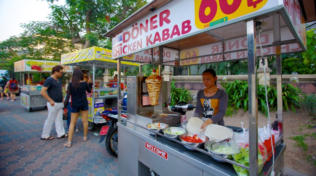 Walking Street which includes street scenes, markets and signage