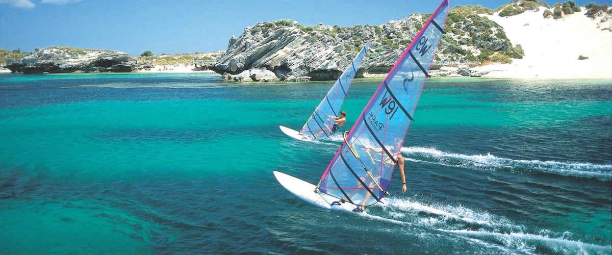 Rottnest Island featuring rocky coastline, island views and tropical scenes
