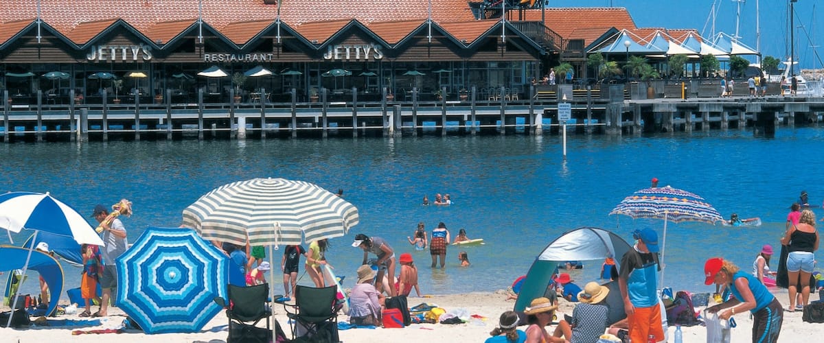 Hillarys which includes a sandy beach as well as a large group of people