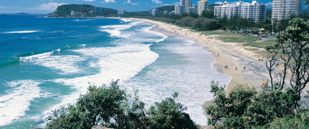 Burleigh Beach showing a high-rise building, city views and general coastal views