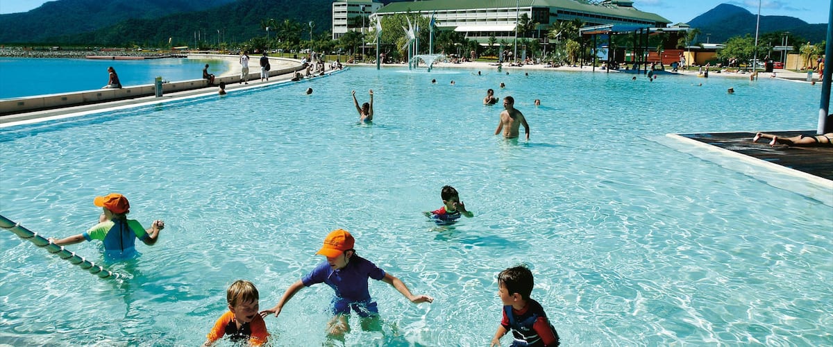 Cairns Esplanade which includes a pool, swimming and a luxury hotel or resort