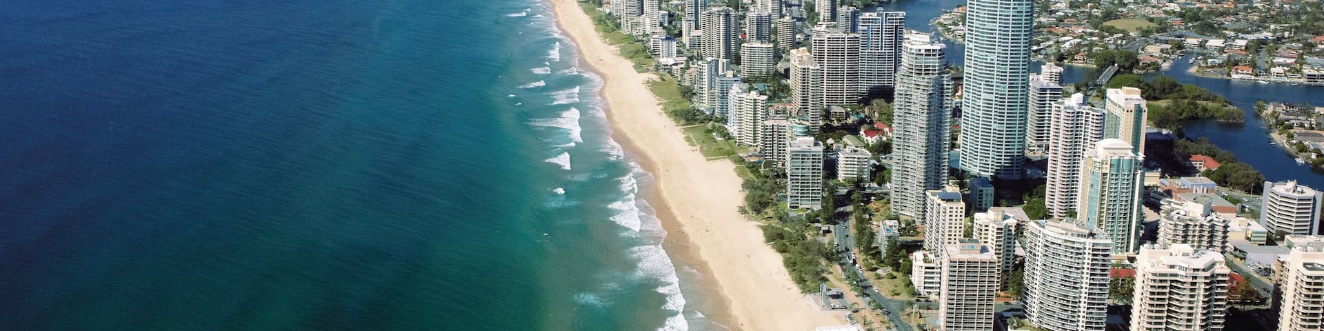 Surfers Paradise Beach which includes skyline, general coastal views and central business district
