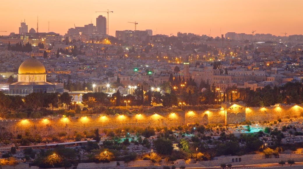 Mount of Olives which includes landscape views, a city and a sunset