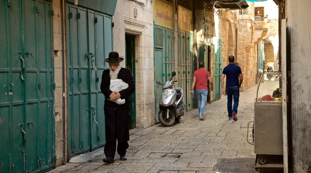 Jerusalem showing street scenes as well as an individual male