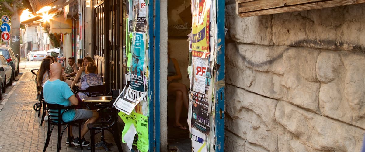 Florentin featuring street scenes and outdoor eating as well as a small group of people