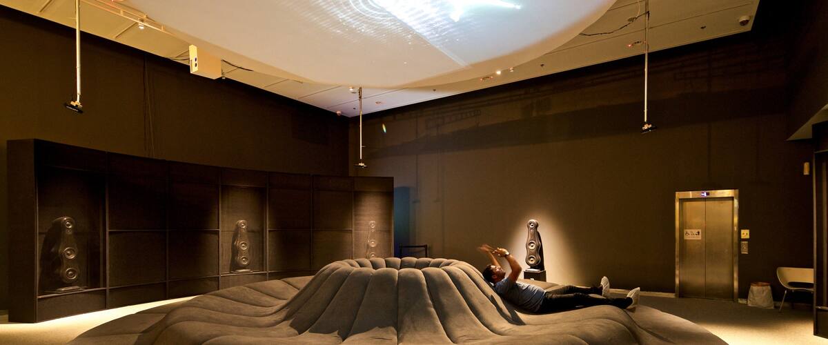 Design Museum Holon showing interior views as well as an individual male