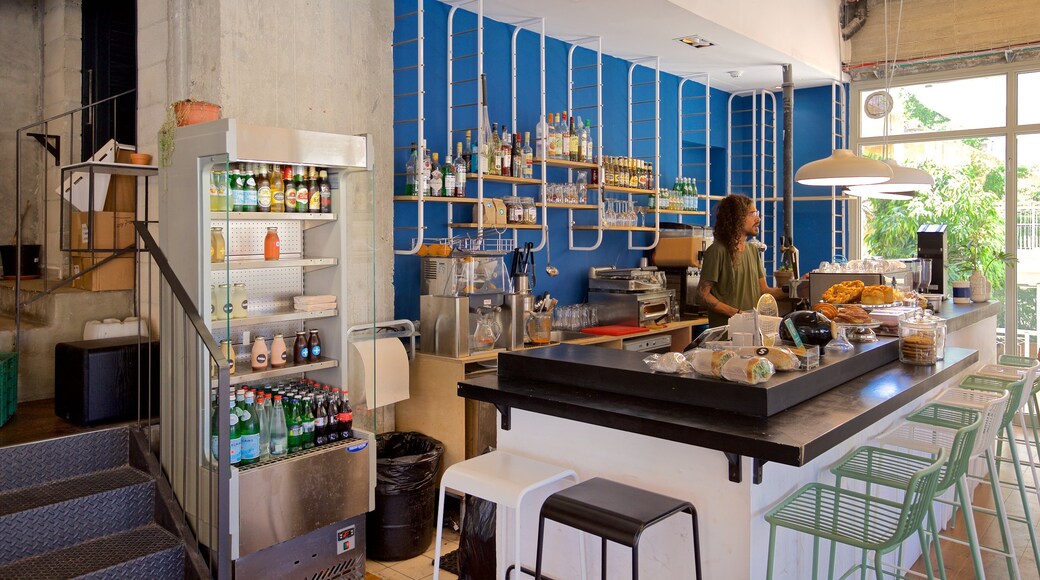 Jaffa featuring café lifestyle and interior views as well as an individual male