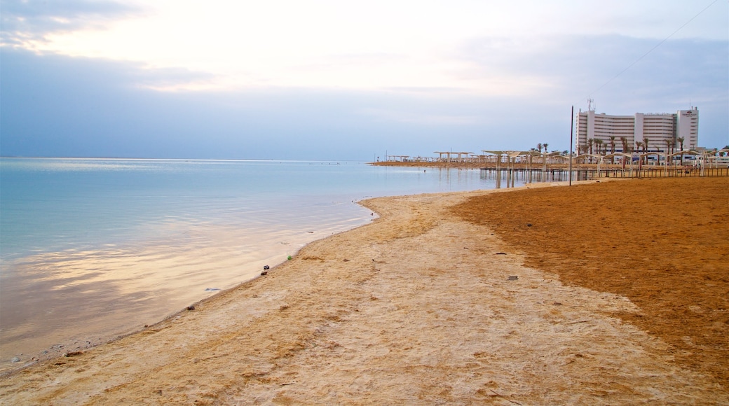 Ein Bokek which includes a sandy beach, a sunset and general coastal views