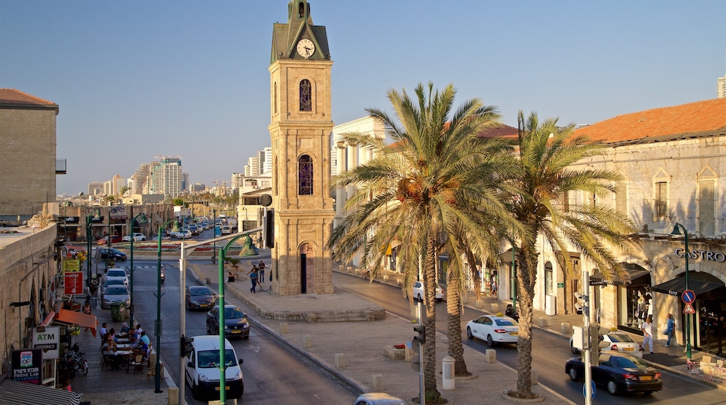 Torre del reloj de Jaffa que incluye un atardecer, arquitectura patrimonial y una ciudad