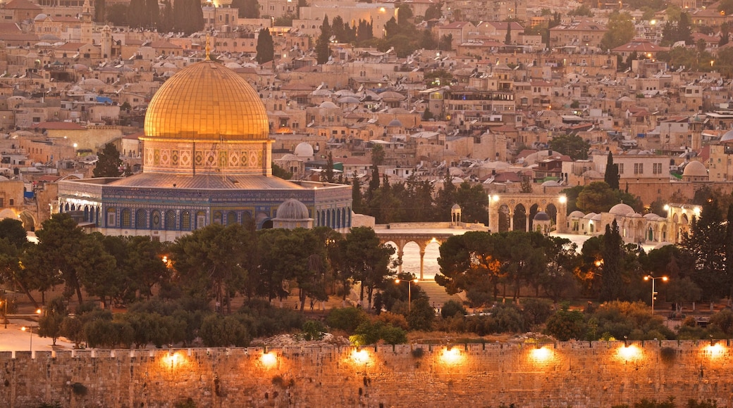 Temple Mount featuring heritage architecture, a city and a sunset