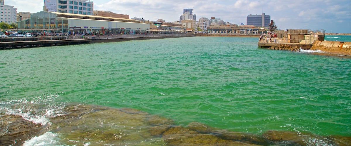Old Tel Aviv Port which includes a coastal town and a bay or harbor