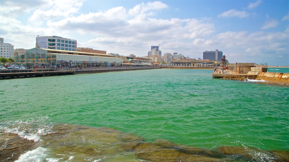 Old Tel Aviv Port which includes a coastal town and a bay or harbor