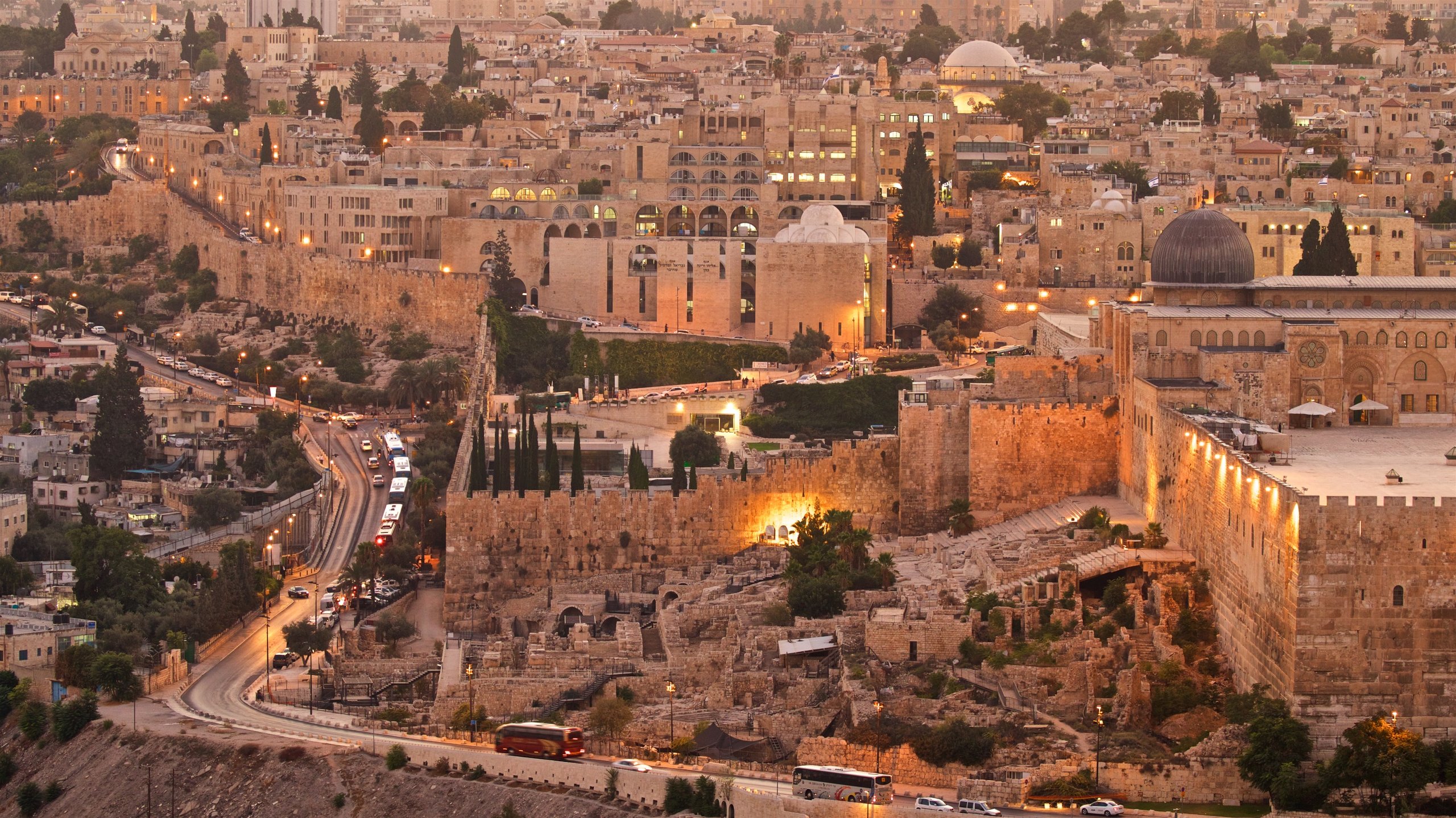 Mount Zion showing a sunset, heritage elements and a city