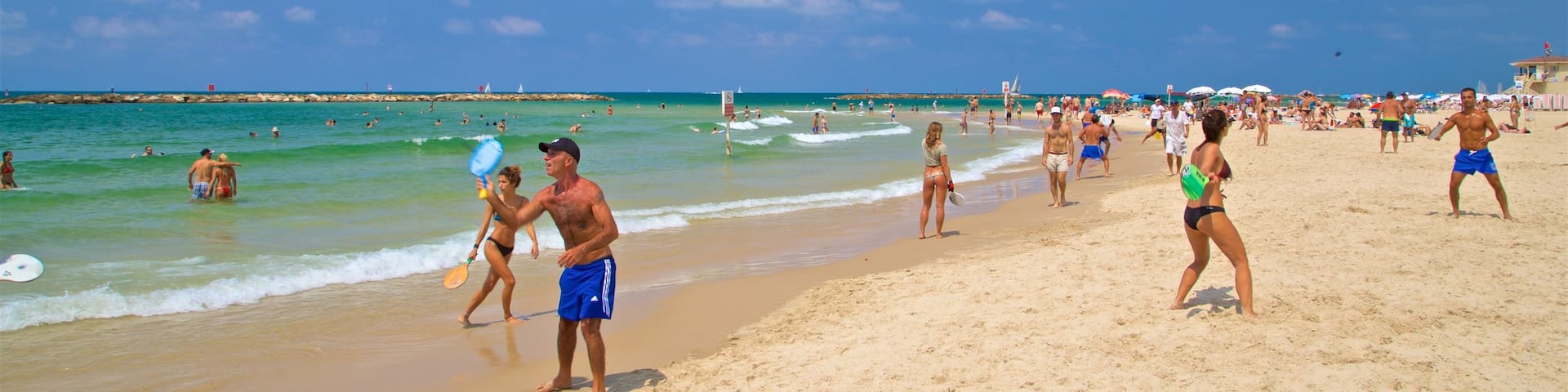 Tel Aviv showing general coastal views, a beach and swimming