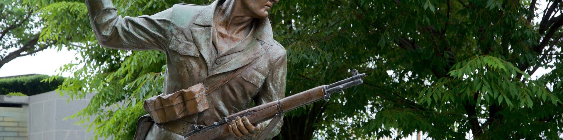 Central Jersey featuring a statue or sculpture and military items