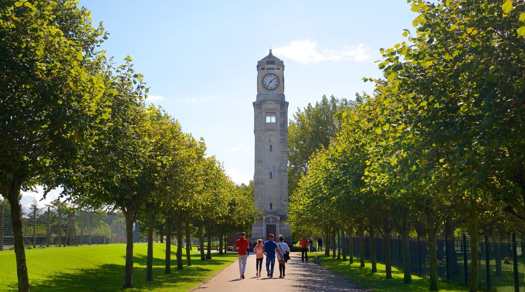 Stanley Park which includes a park and heritage architecture as well as a small group of people