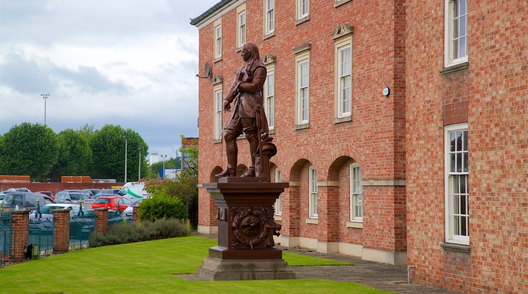 Warrington which includes a statue or sculpture