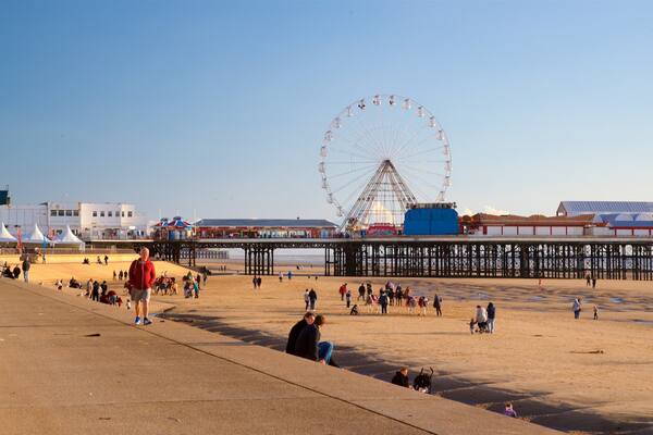Blackpool Beach featuring general coastal views and a beach as well as a small group of people