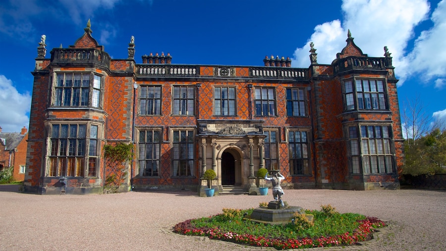 Arley Hall And Gardens showing wildflowers, a house and heritage architecture