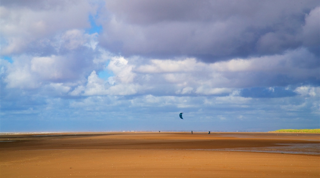 Ainsdale Beach featuring a sandy beach, landscape views and kite surfing