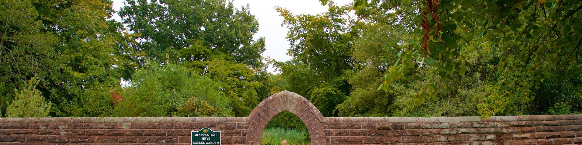 Grappenhall Heys Walled Garden showing a garden and heritage elements as well as an individual femail