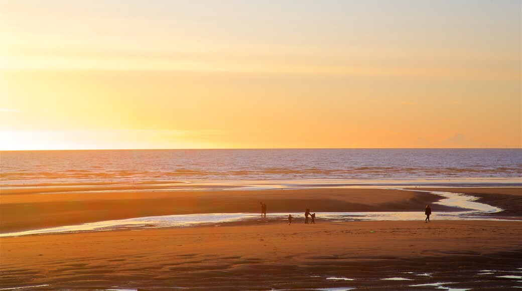 Central Beach which includes a sunset, landscape views and a sandy beach