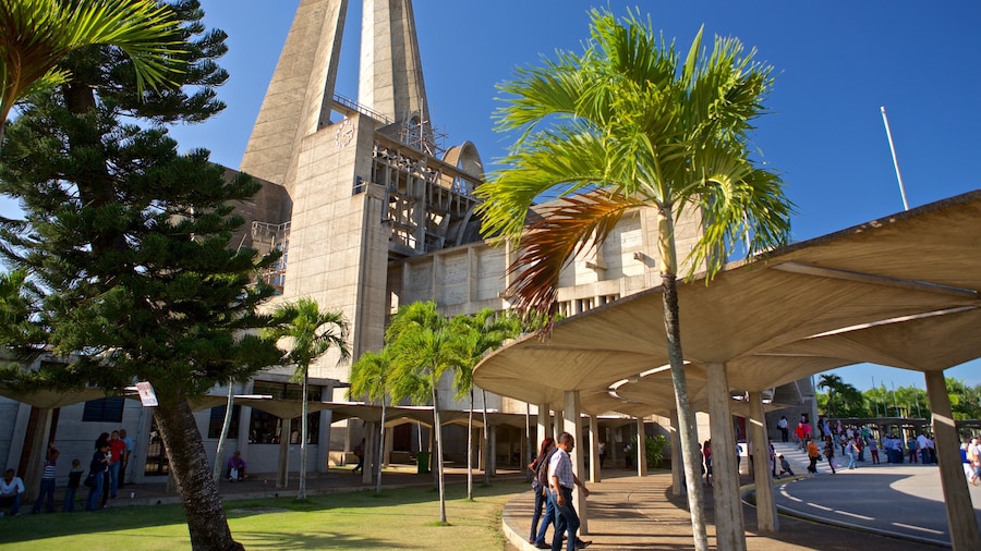 La Altagracia Cathedral showing modern architecture as well as a couple