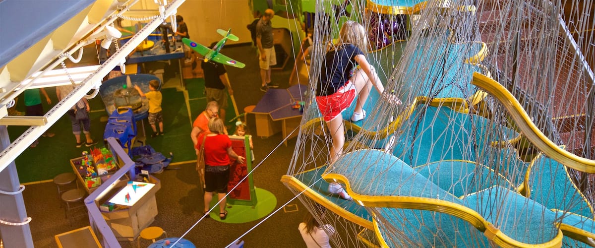 Wonderlab Science Museum featuring interior views as well as a small group of people
