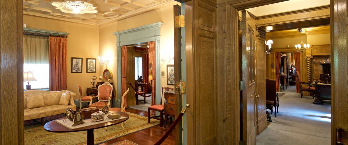 The History Museum which includes a house, interior views and heritage elements
