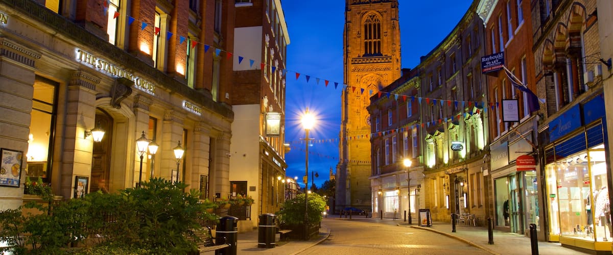 Derby Cathedral showing night scenes, heritage architecture and a city
