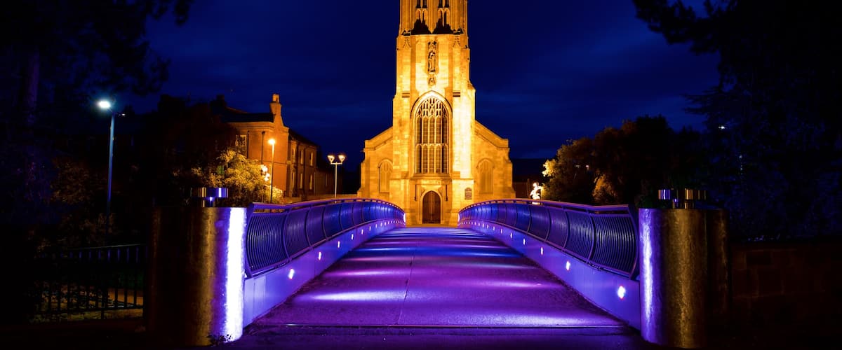Derby showing heritage architecture, night scenes and a bridge