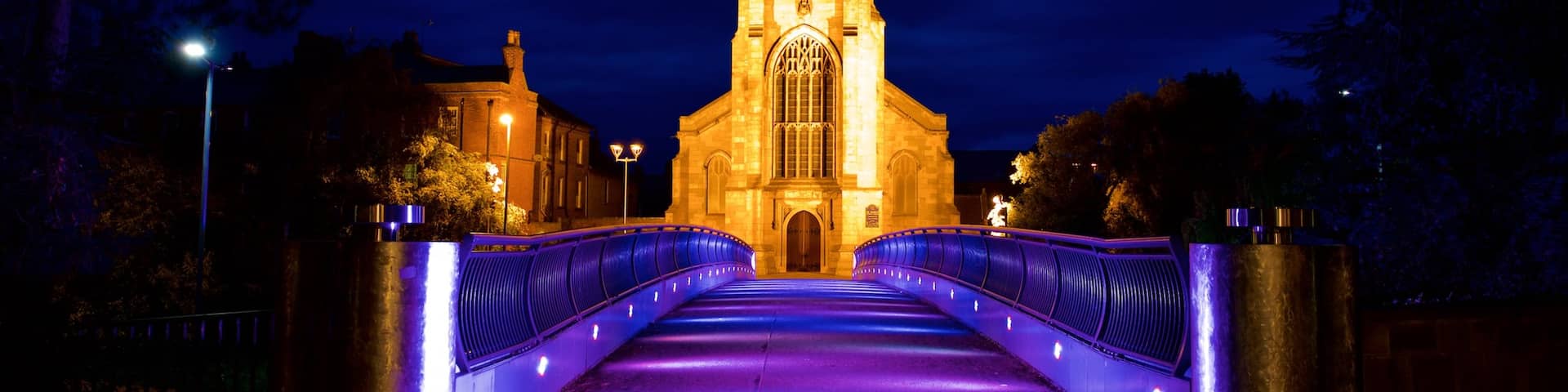 Derby showing heritage architecture, night scenes and a bridge